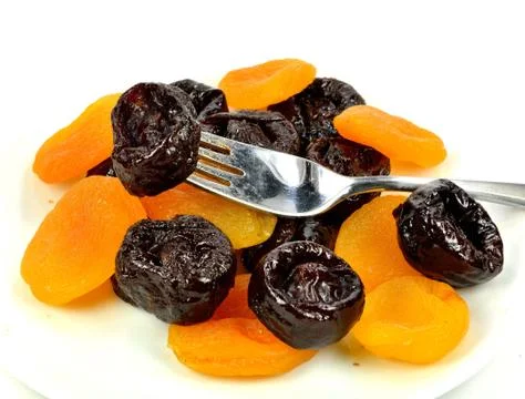 Prunes and apricots Stock Photos
