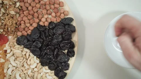 Prunes benefit or harm. Daily intake of nuts 動画素材 169075053