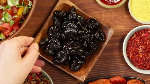 Prunes close-up, dried fruits, vegetarian food. Healthy eating. Middle eastern Stock Footage 166320138