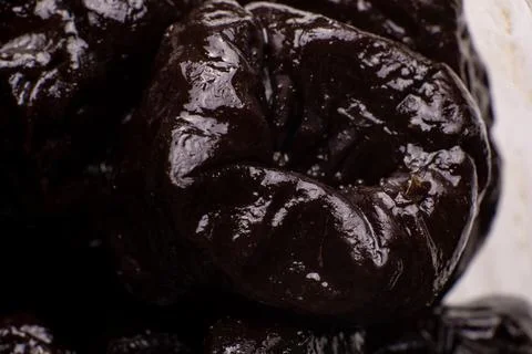 Prunes close up. Fruit background. Stock Photos