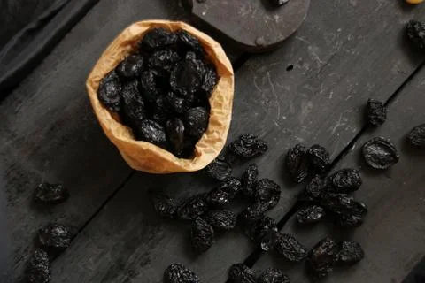 Prunes on a dark background Stock Photos