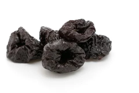 Prunes isolated on a white Stock Photos