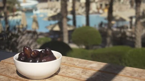 Prunes on the wood table Stock Footage 74919874