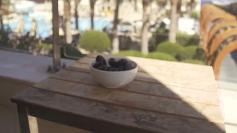 Prunes on the wood table Stock Footage 74921211