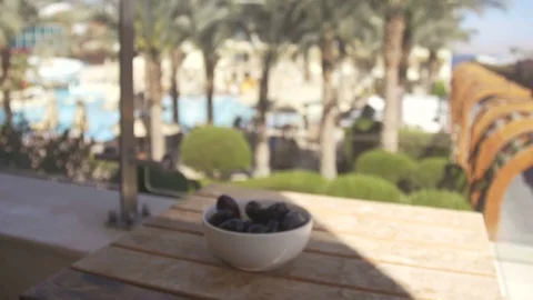 Prunes on the wood table Stock Footage 74921560
