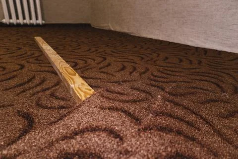 Pruning cutting carpet construction work laying floor sharp blade knife 库存照片