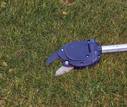 Pruning shears for high-altitude work. Close-up Stock Photos