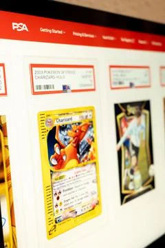 Psa website showing graded pokemon charizard trading card 写真素材