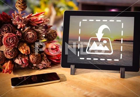 PSD template of bouquet of flower, smartphone and digital tablet on the wooden PSD Template