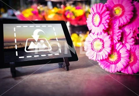 PSD template of bunch of pink sunflower and digital tablet on the table at a PSD-Vorlage