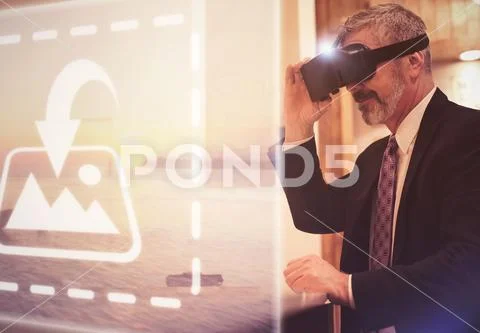 PSD template of businessman using virtual reality simulator while sitting at PSD Template