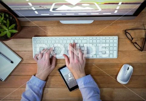 PSD template of Businessman working on computer at desk in office PSD Template