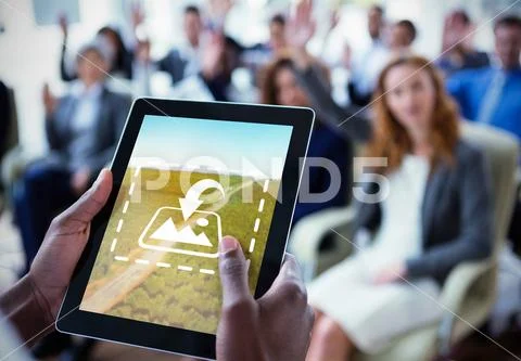 PSD template of businessperson using digital tablet during meeting in office PSD Template