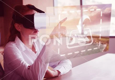 PSD template of businesswoman using virtual reality simulator at desk in office PSD Template