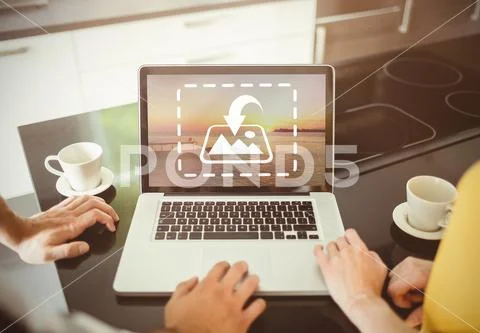 PSD template of close-up of couple using laptop in the kitchen at home Template PSD