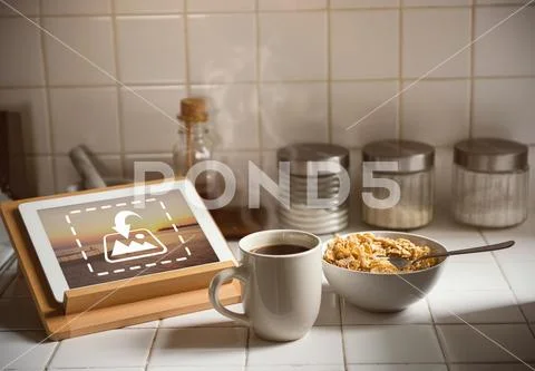 PSD template of digital tablet and breakfast on kitchen worktop at home PSD Template