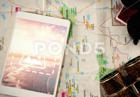 PSD template of digital tablet with passport, sunglasses and binoculars on map PSD Template