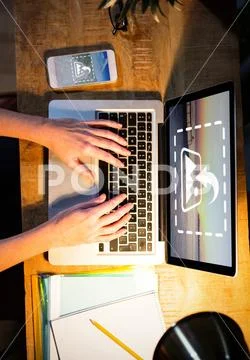 PSD template of female executive working on laptop at table in the office PSD Template