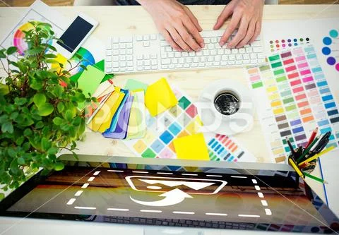 PSD template of graphic designer working on computer at desk in office Modello PSD