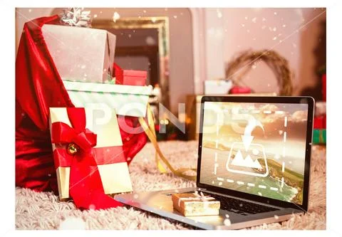 PSD template of laptop and gifts on floor at home during Christmas Modello PSD