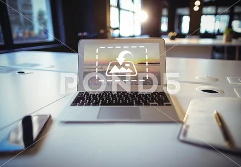 PSD template of Laptop, diary and smartphone on desk in office PSD Template