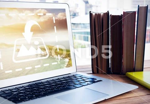 PSD template laptop on wooden table in office Modello PSD