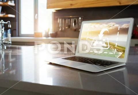 PSD template of laptop on worktop in kitchen at home PSD Template