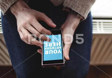 PSD template of man using mobile phone at home PSD Template