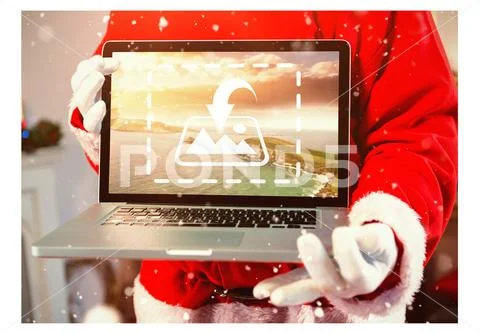 PSD template of Santa Claus holding laptop at home PSD Template