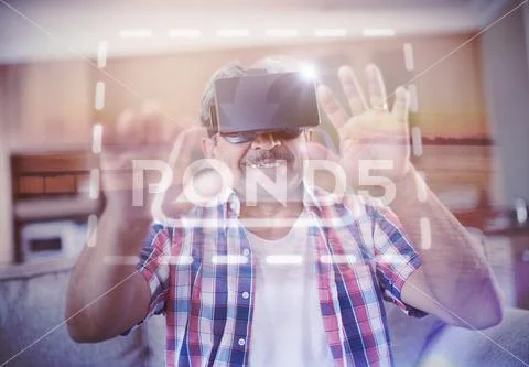 PSD template of senior man wearing virtual reality headset in living room at PSD Template