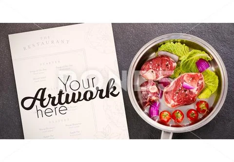 PSD template of sirloin chops and ingredients in frying pan against black PSD Template