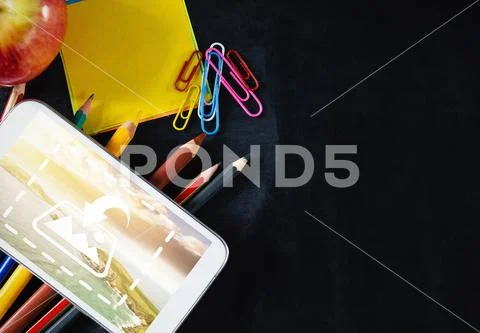 PSD template of stationery, apple and mobile phone on table PSD Template