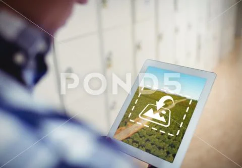 PSD template of student using digital tablet in locker room at college Modello PSD