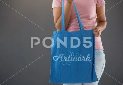 PSD template of woman holding shopping bag against grey background PSD Template