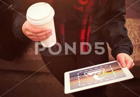 PSD template of woman holding tablet and coffee cup while standing on field PSD Template