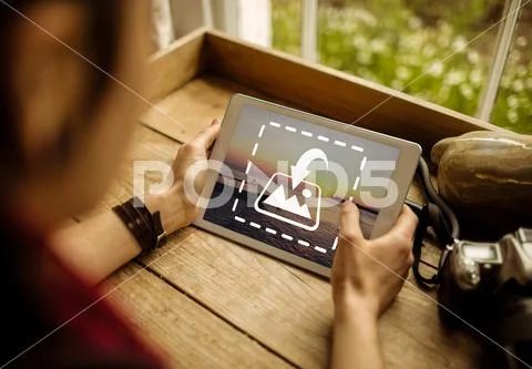 PSD template of woman using digital tablet at wooden table at home PSD Template