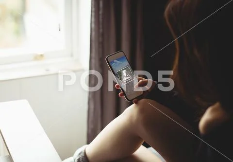 PSD template of woman using mobile phone at home PSD Template