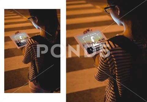 PSD template of woman using tablet while crossing road at night PSD Template