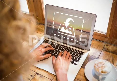 PSD template of woman working on laptop at table in café PSD Template