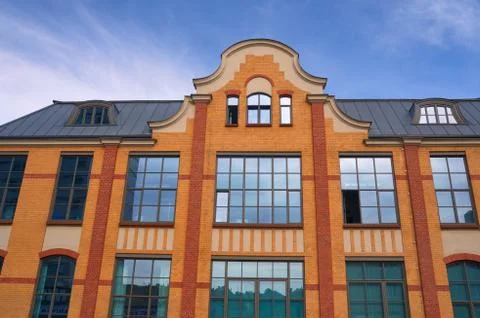 Pseudo-gothic facade of a building Stock Photos