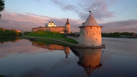 Pskov Kremlin, Russia, at sunset, illuminated by the rays of the sun. Stock Footage