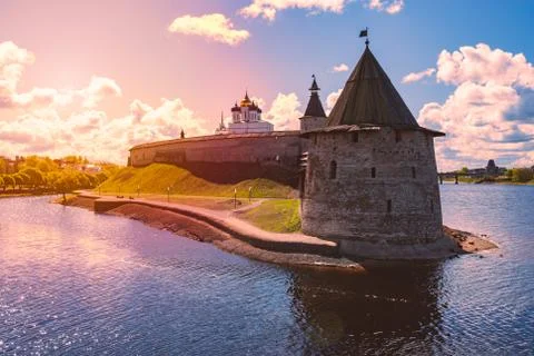 Pskov kremlin tower with blue cloudy sky Stock Photos