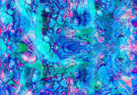 Psychedelic abstract background with mixed acrylic paints and Gray stone. Des Stock Photos