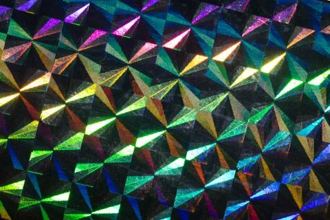 Psychedelic abstract formed by light reflecting off a textured metal surface Foto stock