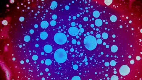 Psychedelic abstract liquid light show, organic paint swirls. Trippy wallpaper. Stock Footage