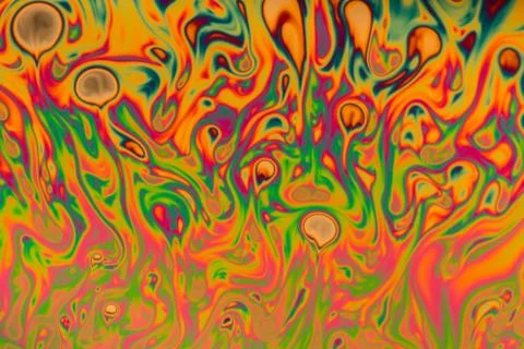 Psychedelic abstract made by light reflecting off of a soap bubble Stock Photos