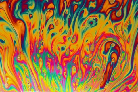 Psychedelic abstract made by light reflecting off of a soap bubble Stock Photos