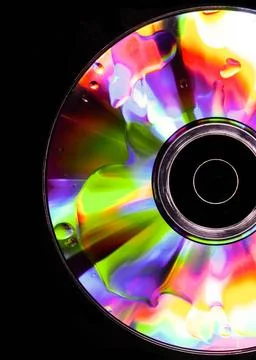 Psychedelic CD Satured colors for this CD with oil drops on the surface Co... Stock Photos