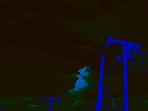 Psychedelic Electric Utility Pole Power Lines Against Dark Night Sky Blue B.. 写真素材