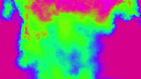 A psychedelic explosion. A multi-coloured explosion of fire and puffs of smoke. Stock Footage 239702586